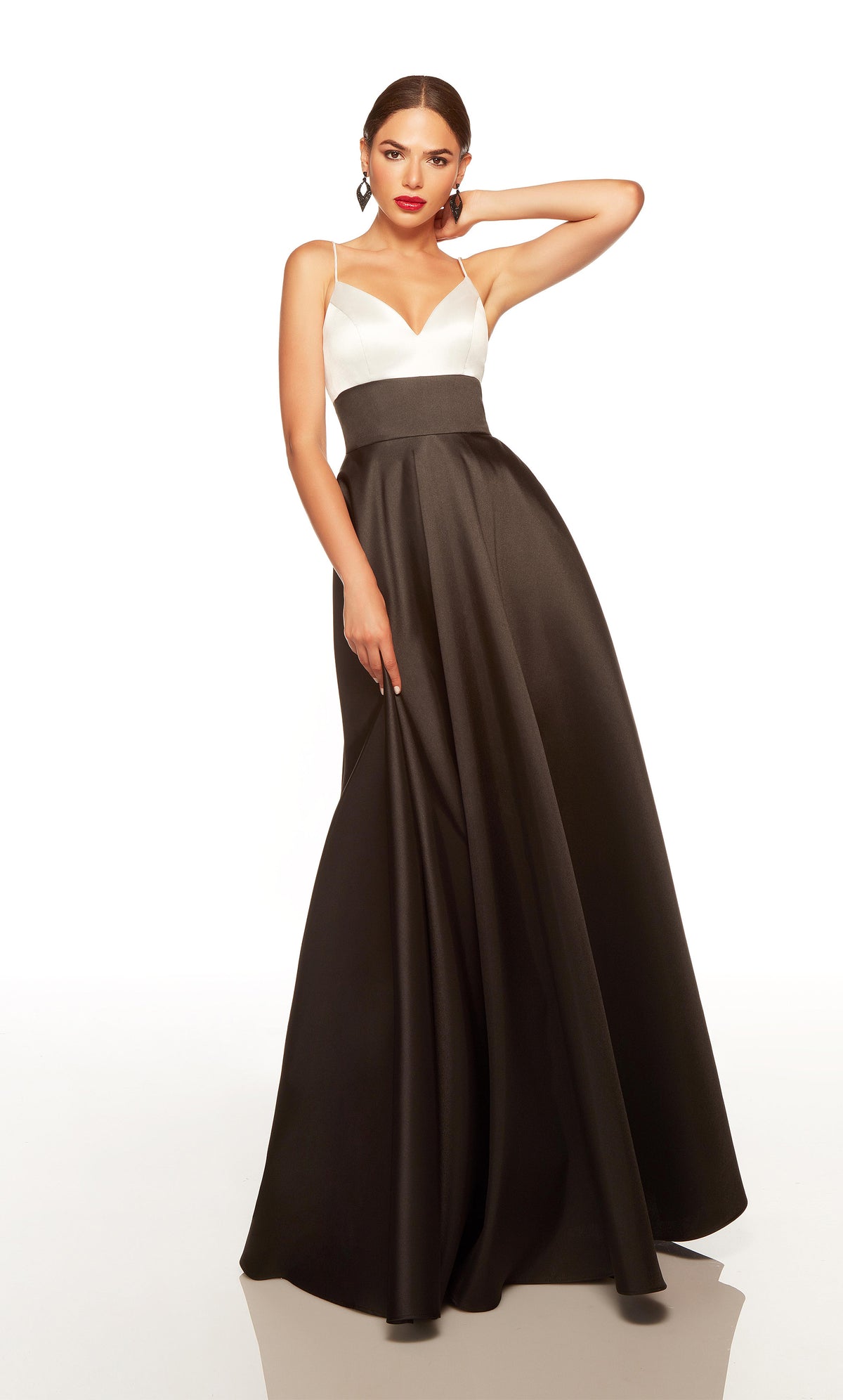 Black and white elegant prom dress with a V neckline, and pockets.