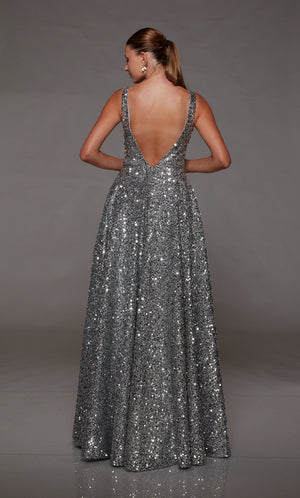 Silver prom dress: A-line silhouette, plunging neckline, front slit, and an chic V-shaped back for an stylish and glam look. Designed by ALYCE Paris.