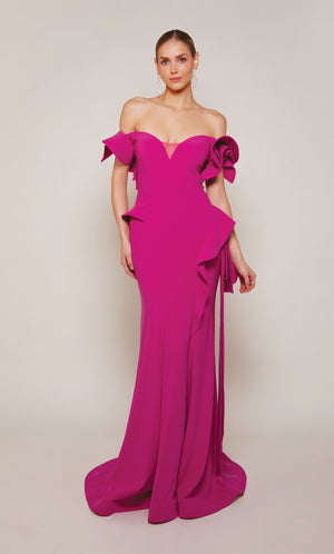 A chic, raspberry pink wedding guest dress boasting an off-the-shoulder neckline, rosette sleeves, and a sheath skirt with cascading ruffles. An excellent choice for a formal evening wedding.