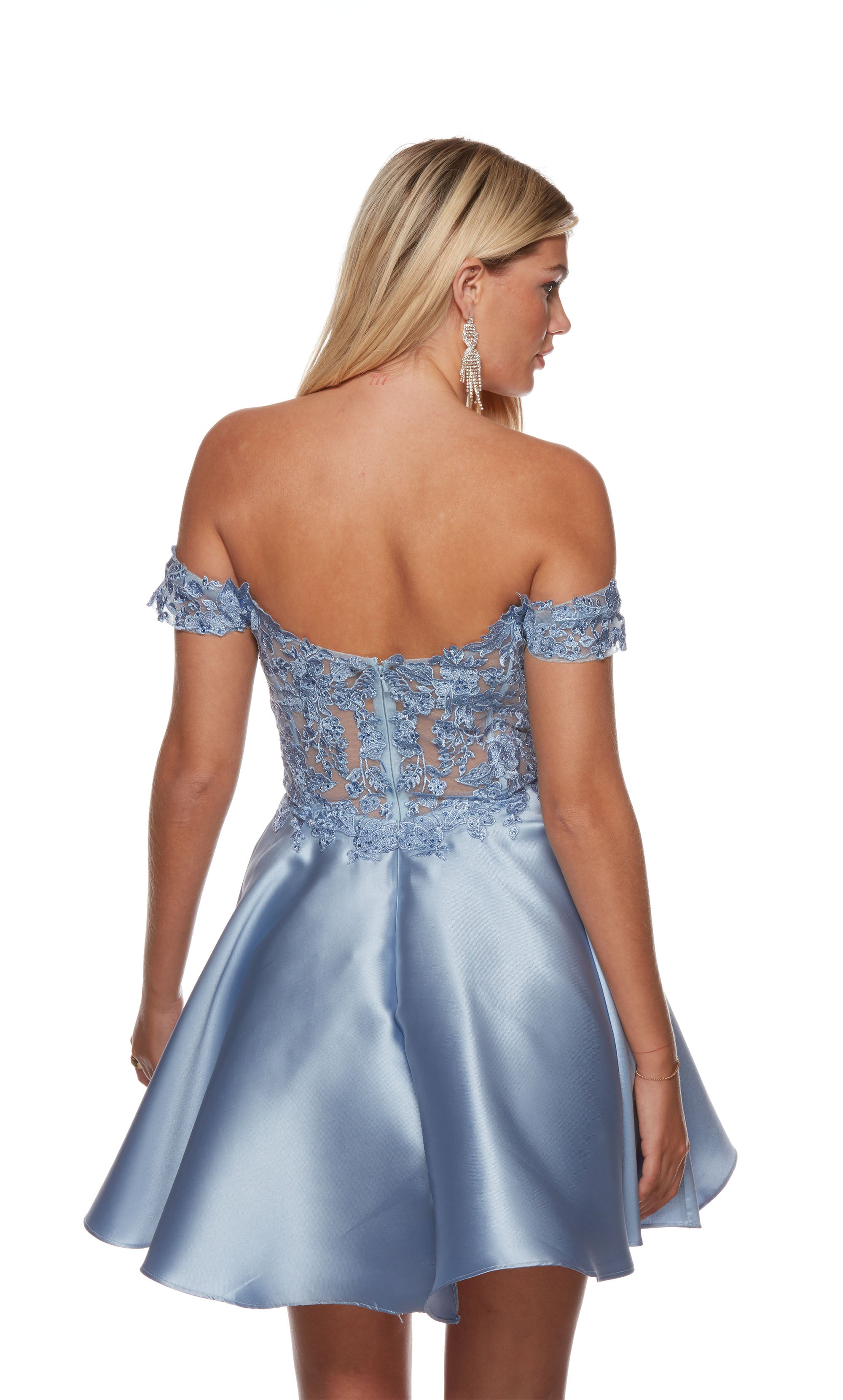 A Mikado flare dress with an off-the-shoulder neckline and sheer corset bodice adorned with floral lace appliques in the color french blue.