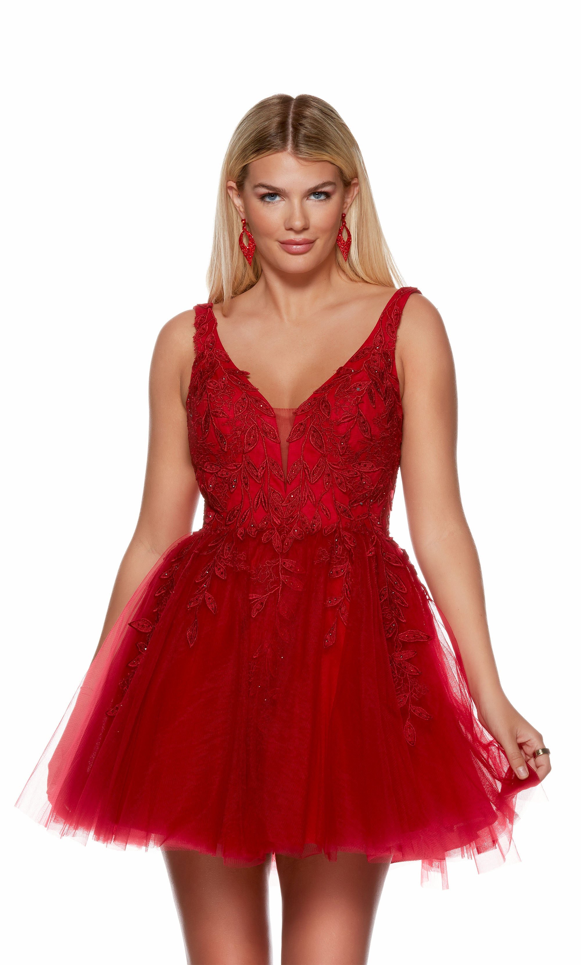 A red, V-neck short formal dress with floral appliques and a fitted waistline. The skirt is made of layered tulle. Shop our latest collection of gorgeous designer dresses by ALYCE Paris.