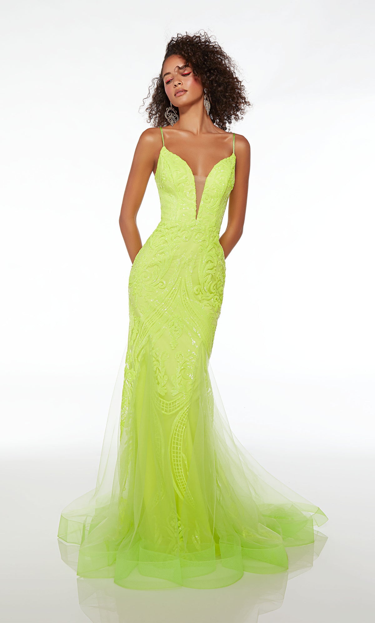 Fitted plunging green prom dress with an lace-up back, fit-and-flare tulle skirt, and paisley sequin design throughout for an stylish and captivating look.