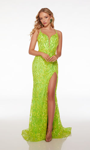 Green prom dress: form-fitting, plunging neckline, high slit, dual spaghetti straps, strappy open back, paisley sequin design, and an stylish train.