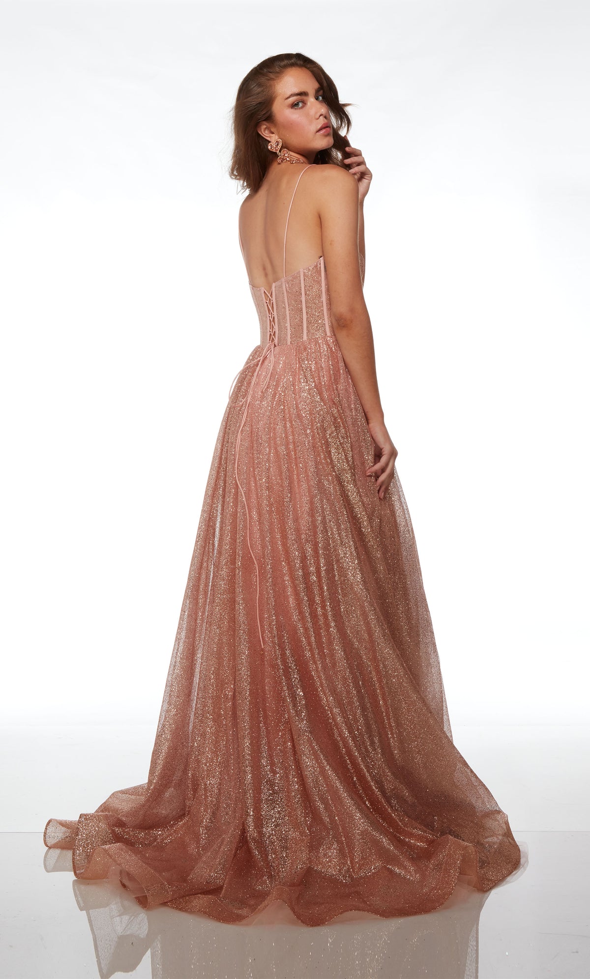 Rose gold corset dress: glitter tulle, plunging neckline, high slit, lace-up back, long train—an elegant and stylish ensemble.